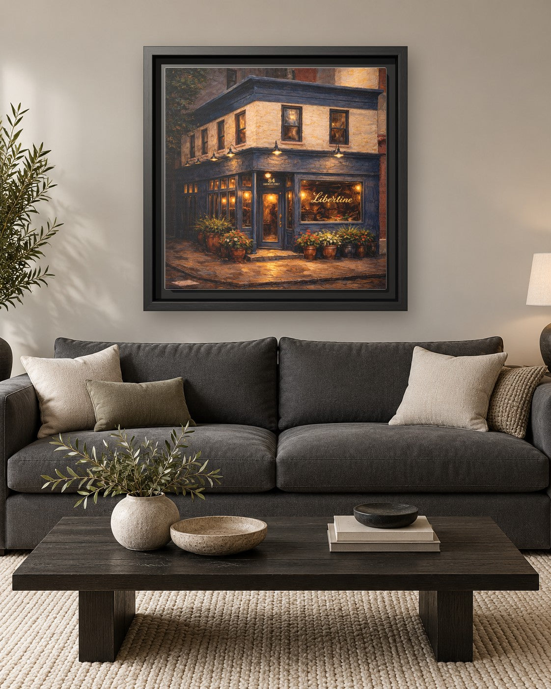 Libertine framed canvas print hanging above a sofa