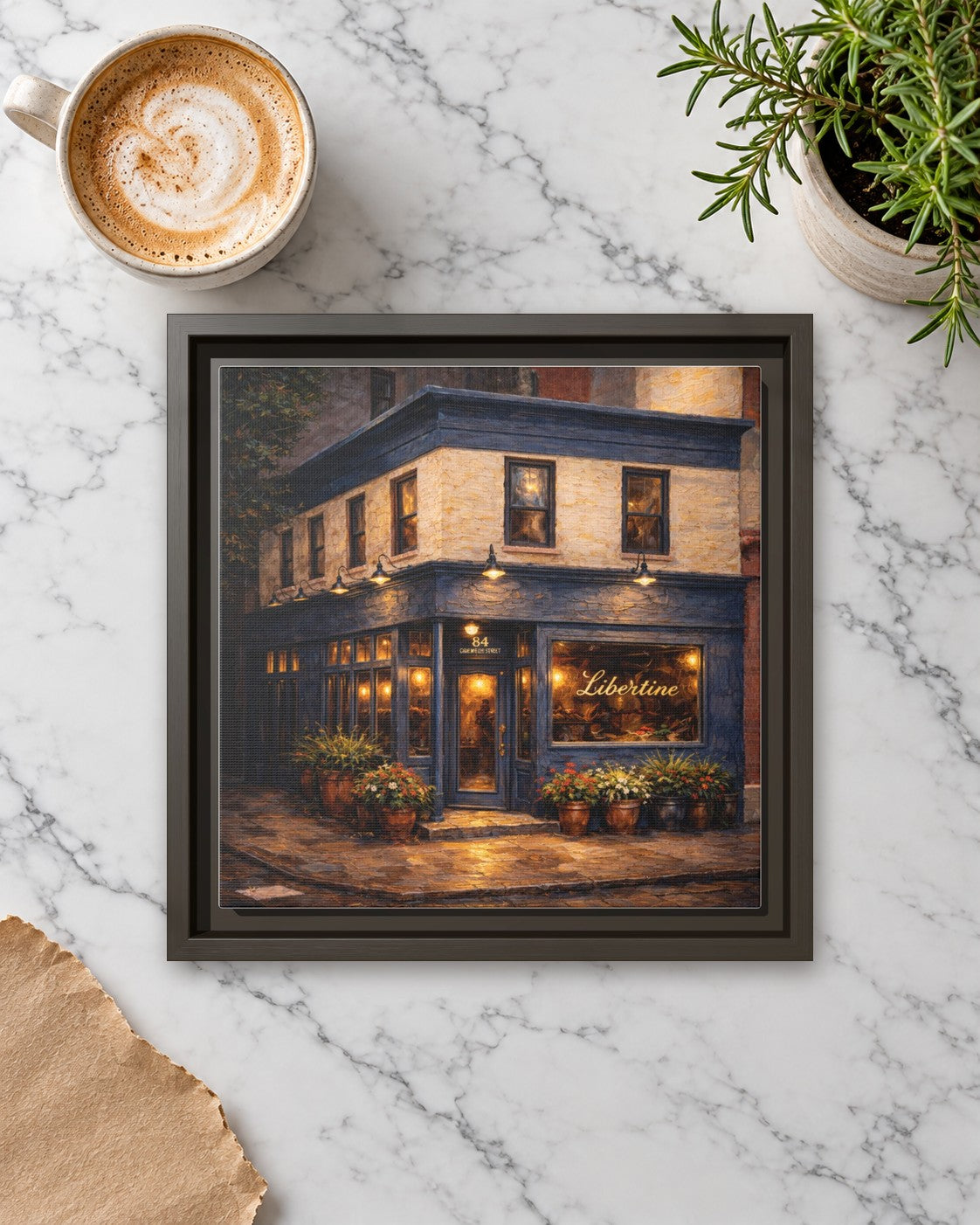 Libertine framed canvas print lying on a table