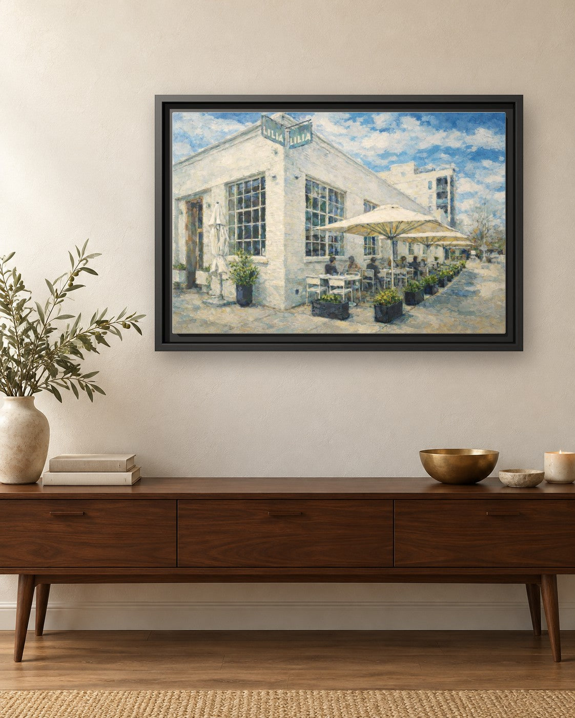 Lilia framed canvas print hanging above a credenza