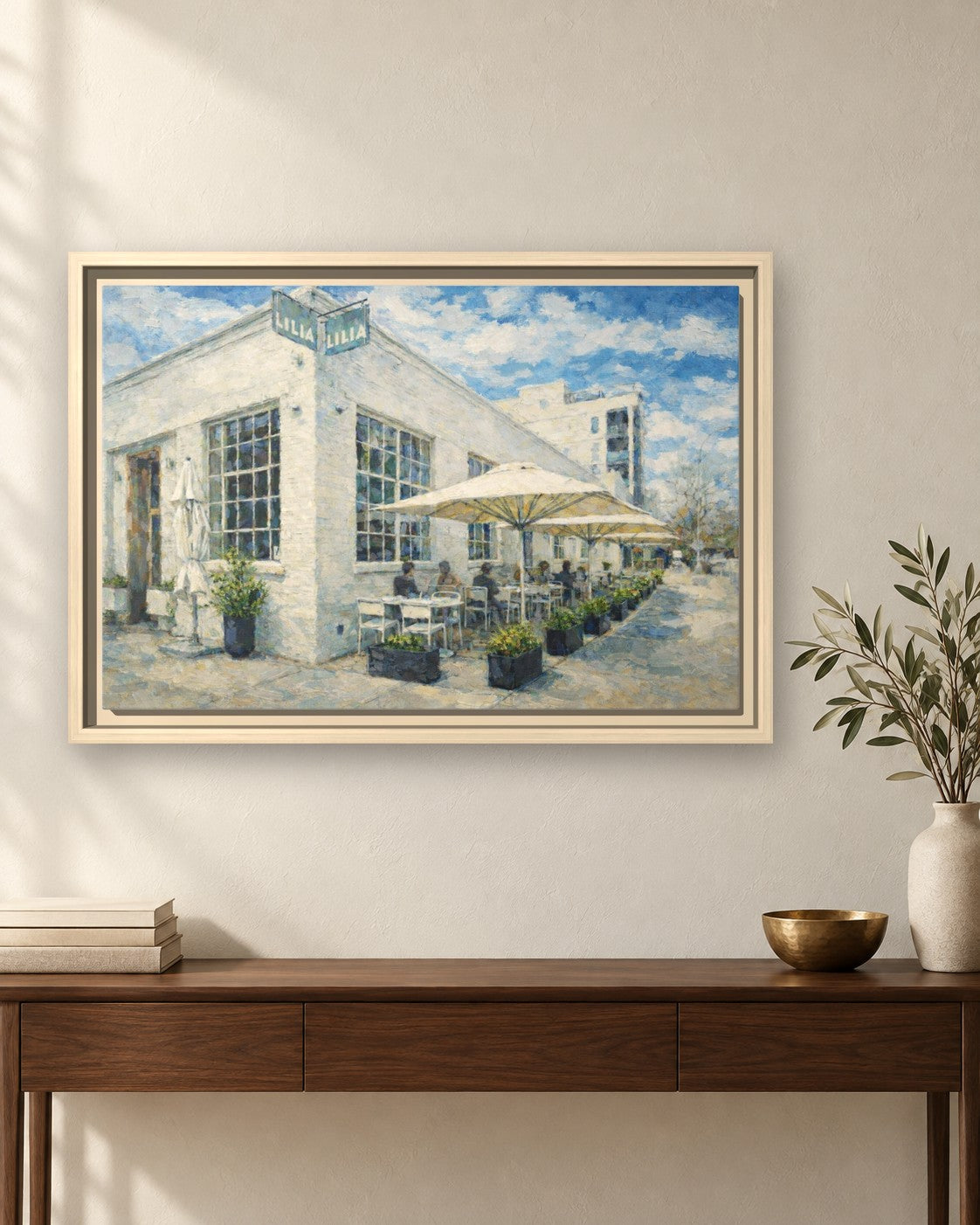 Lilia framed canvas print hanging above a sideboard