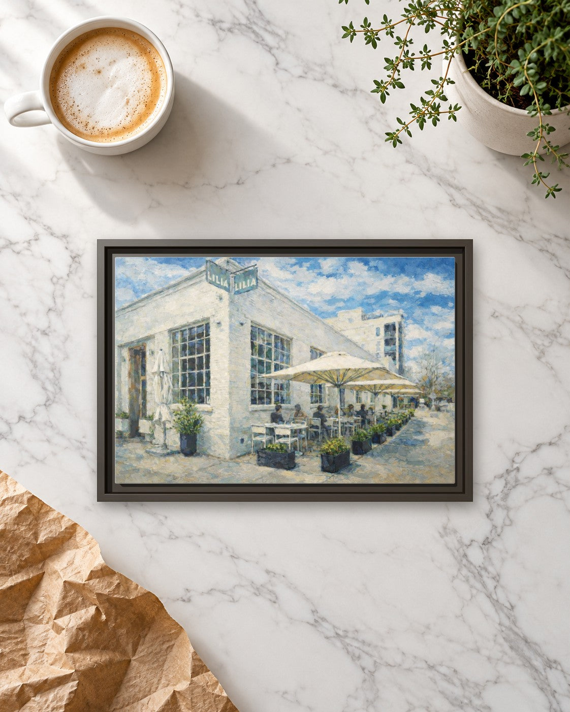 Lilia framed canvas print lying on a table