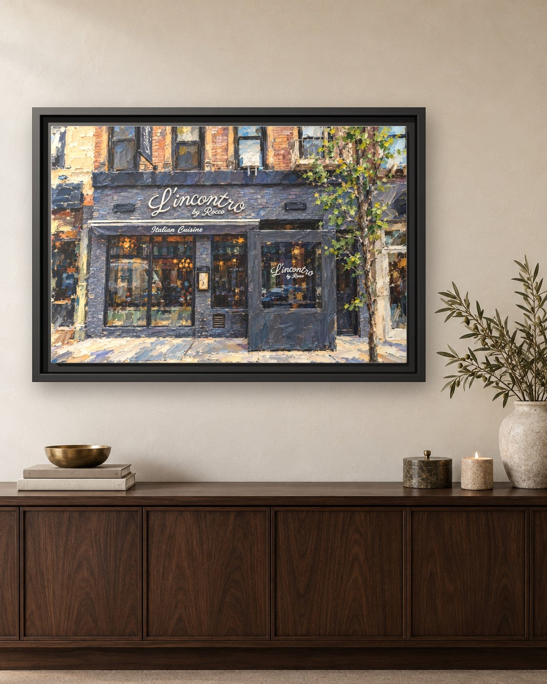 L'incontro by Rocco framed canvas print hanging above a credenza