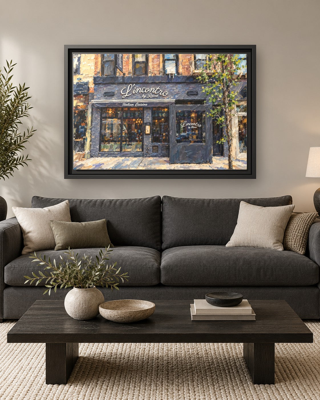 L'incontro by Rocco framed canvas print hanging above a sofa