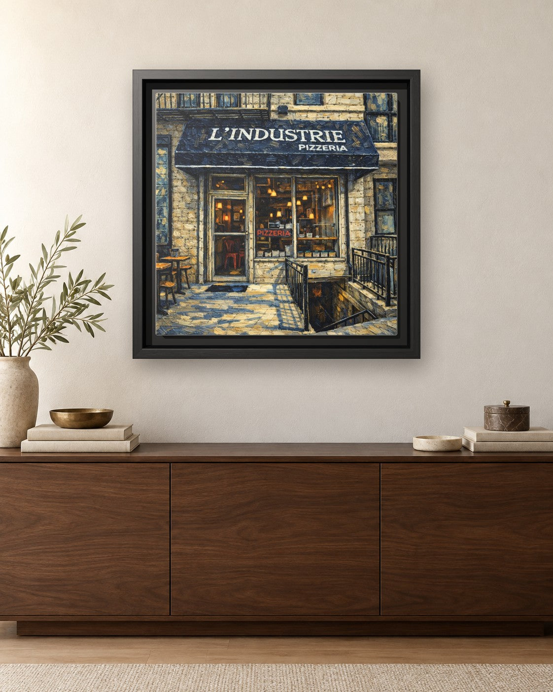 L'industrie Pizza framed canvas print hanging above a credenza