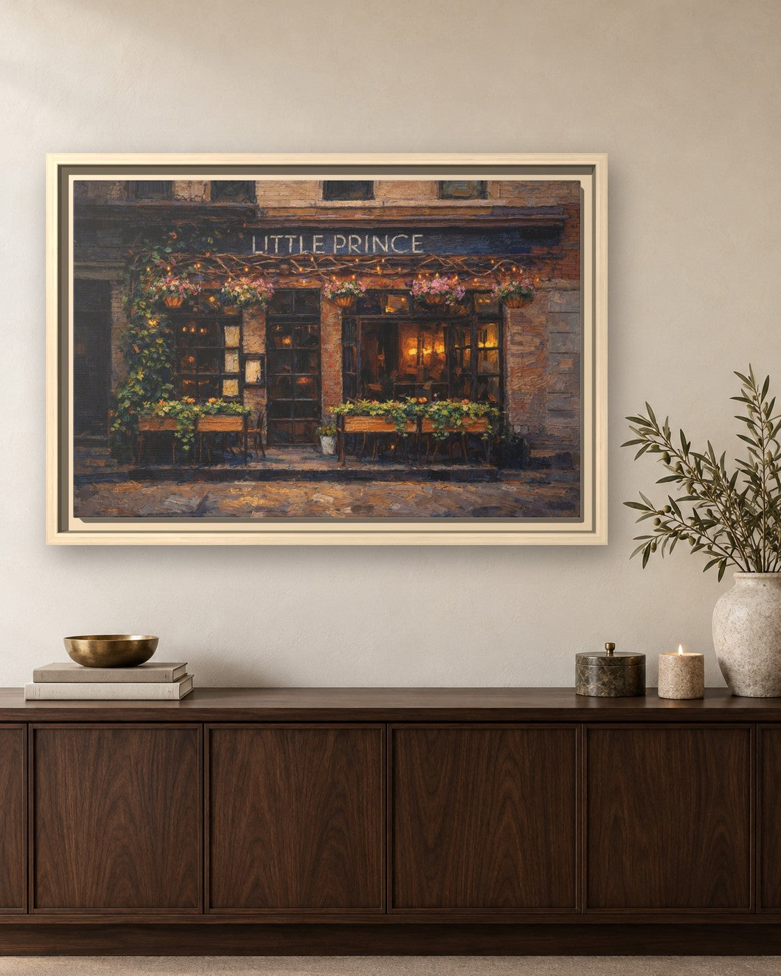 Little Prince framed canvas print hanging above a sideboard