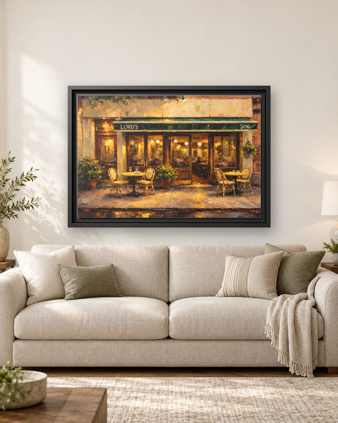 Lord's framed canvas print hanging above a sofa