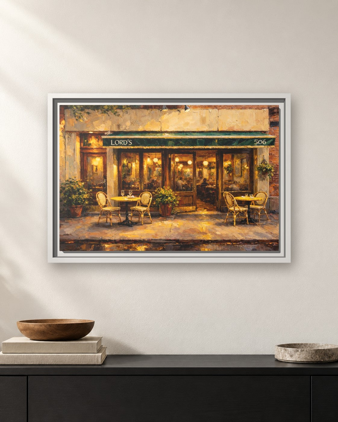 Lord's framed canvas print hanging above a sideboard