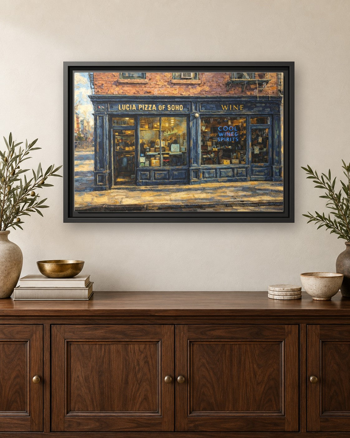 Lucia Pizza of Soho framed canvas print hanging above a credenza