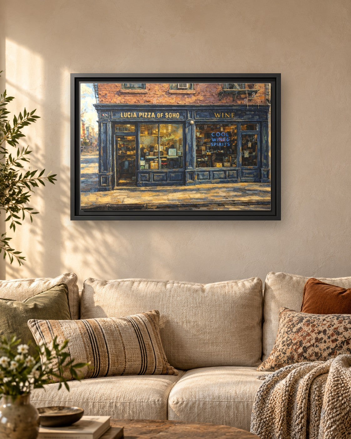 Lucia Pizza of Soho framed canvas print hanging above a sofa