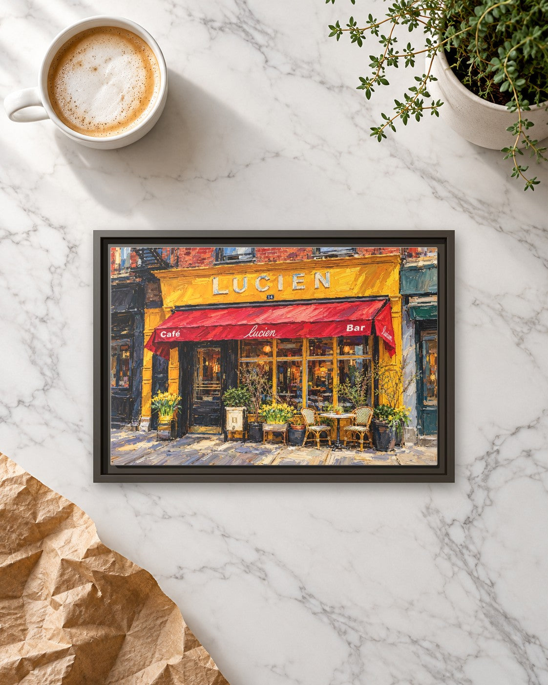 Lucien's framed canvas print lying on a table