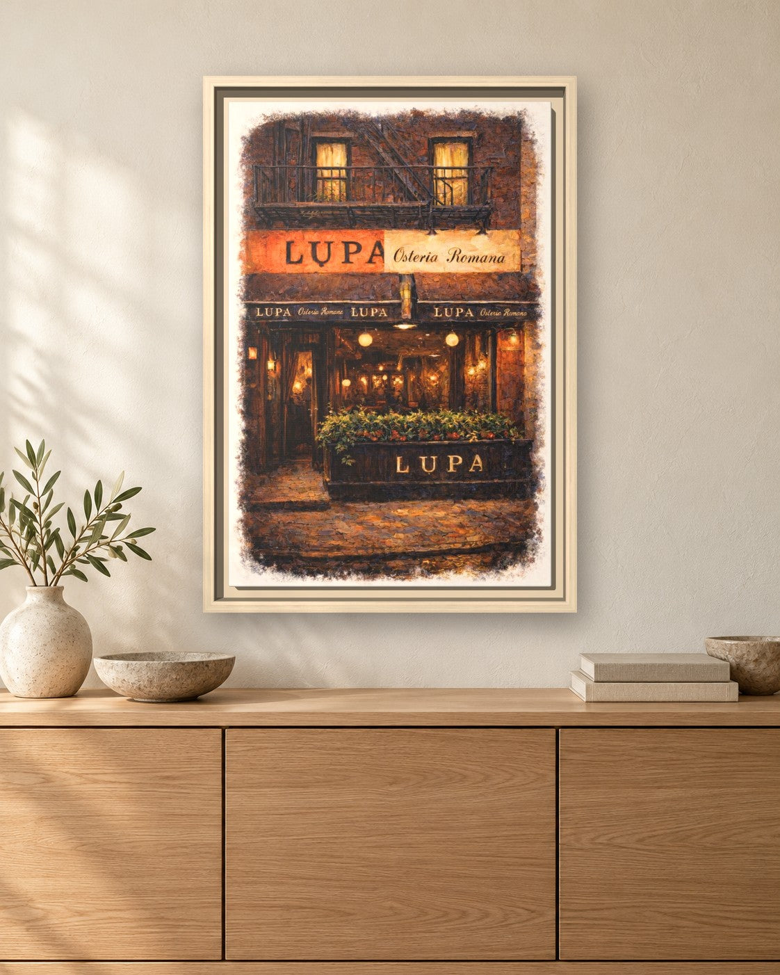 Lupa Osteria Romana framed canvas print hanging above a sideboard