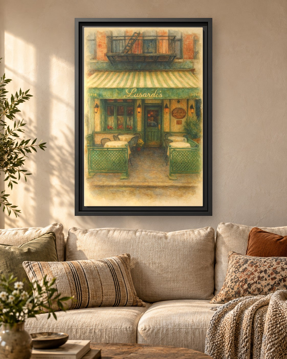 Lusardi's framed canvas print hanging above a sofa