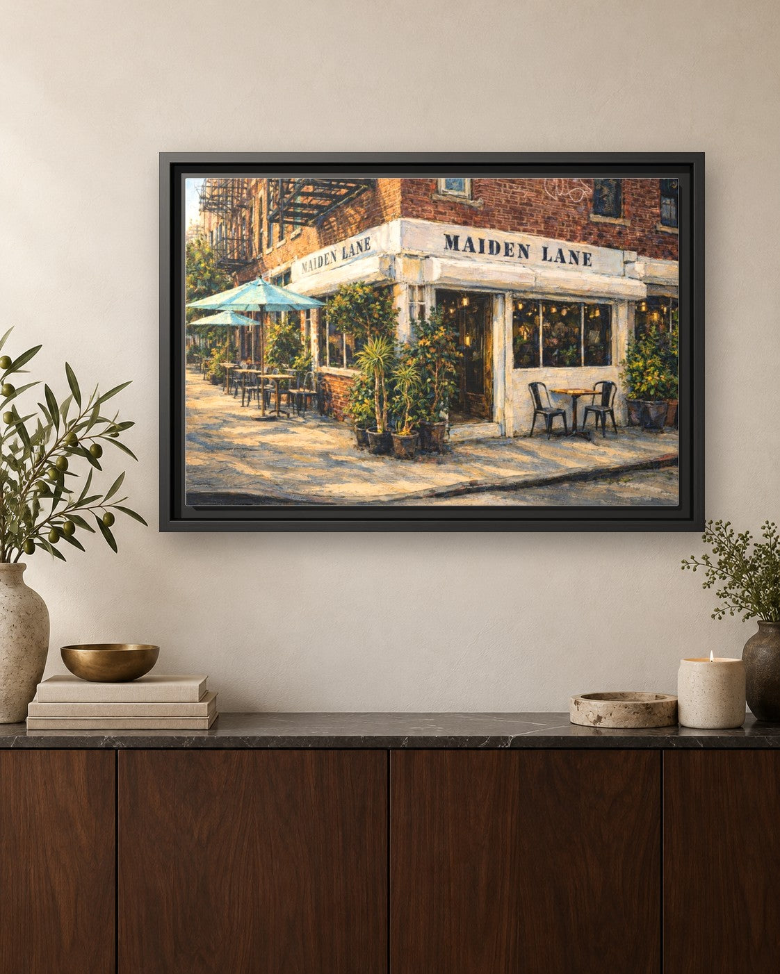 Maiden Lane framed canvas print hanging above a credenza