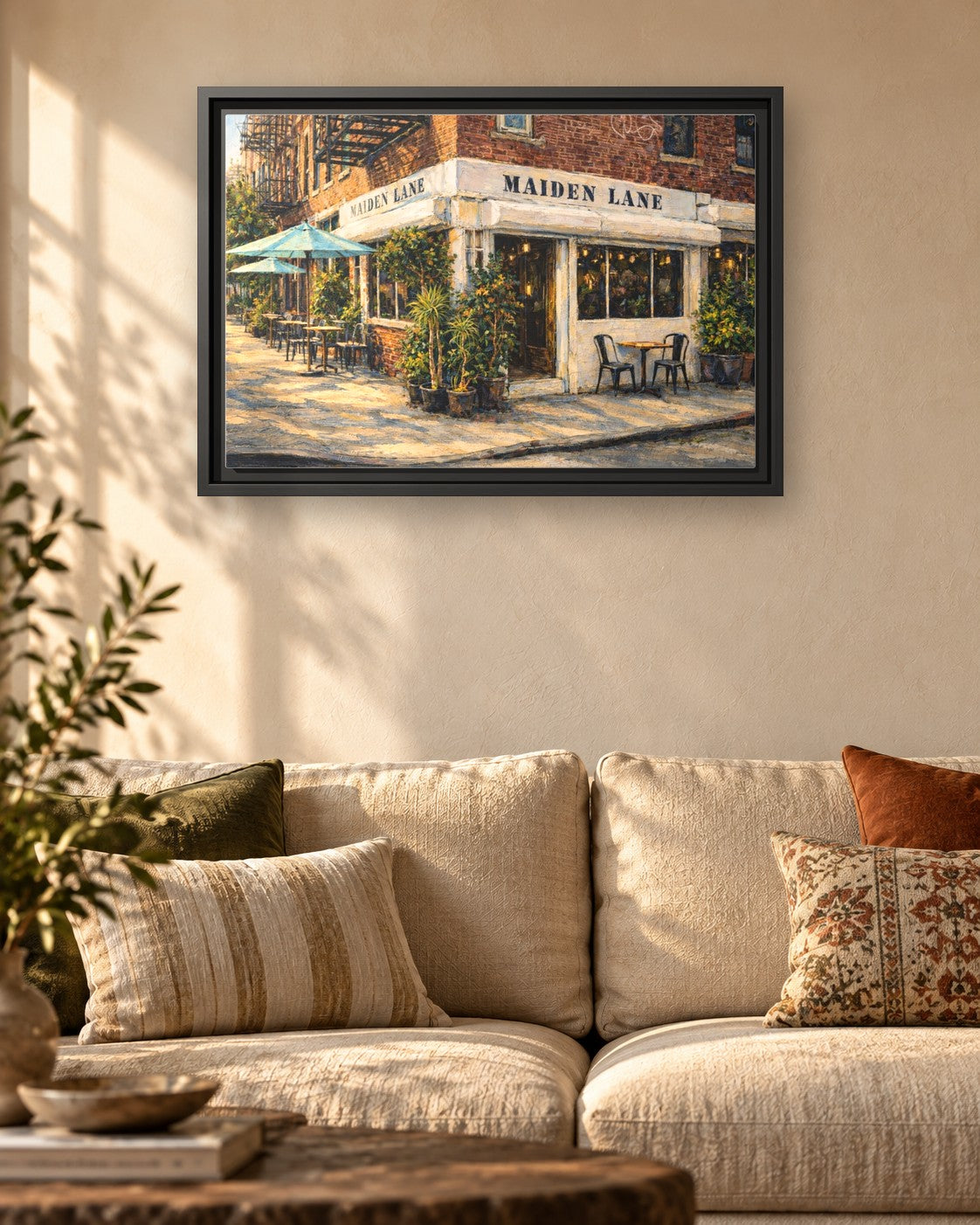 Maiden Lane framed canvas print hanging above a sofa