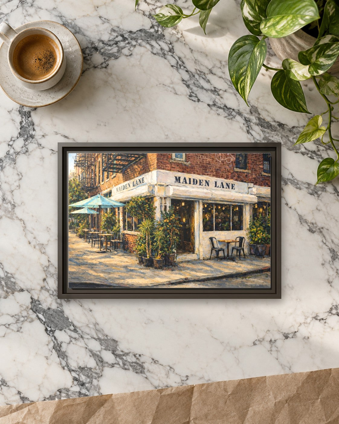 Maiden Lane framed canvas print lying on a table