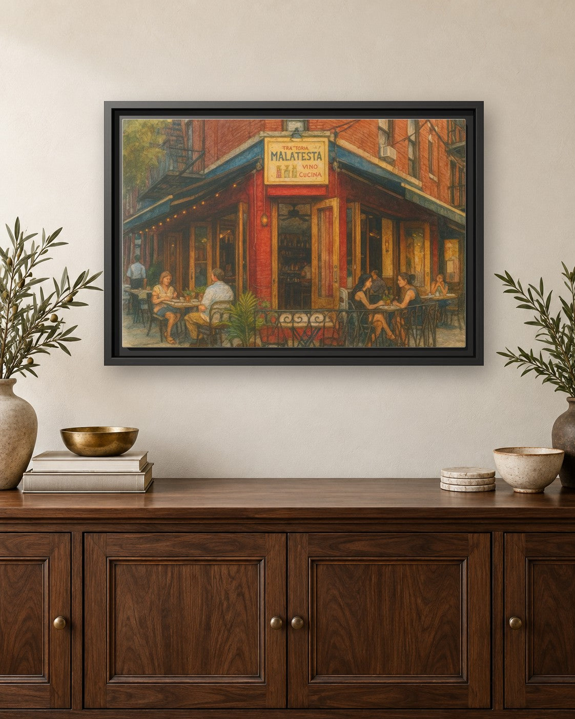 Malatesta Trattoria framed canvas print hanging above a credenza