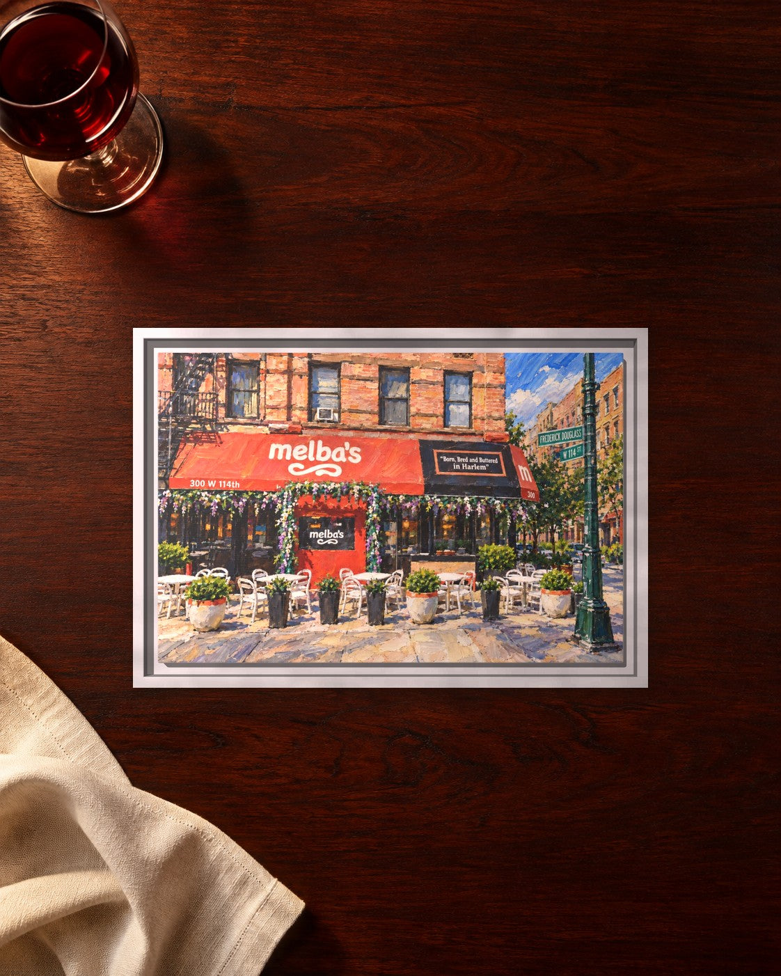Melba's Restaurant framed canvas print lying on a table