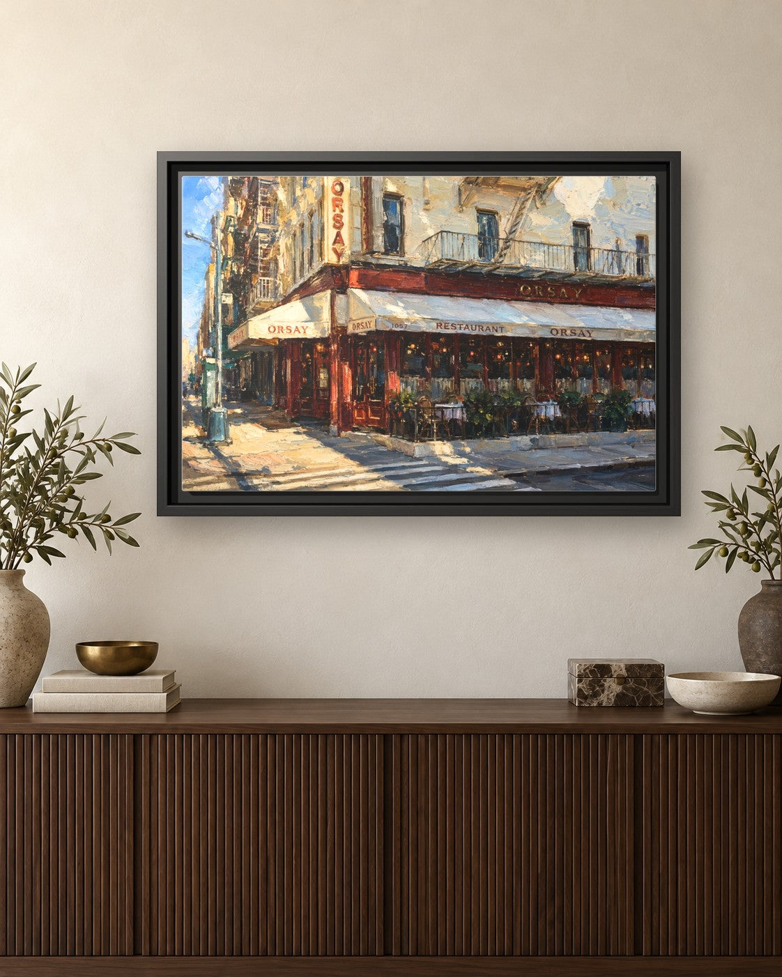Orsay framed canvas print hanging above a credenza