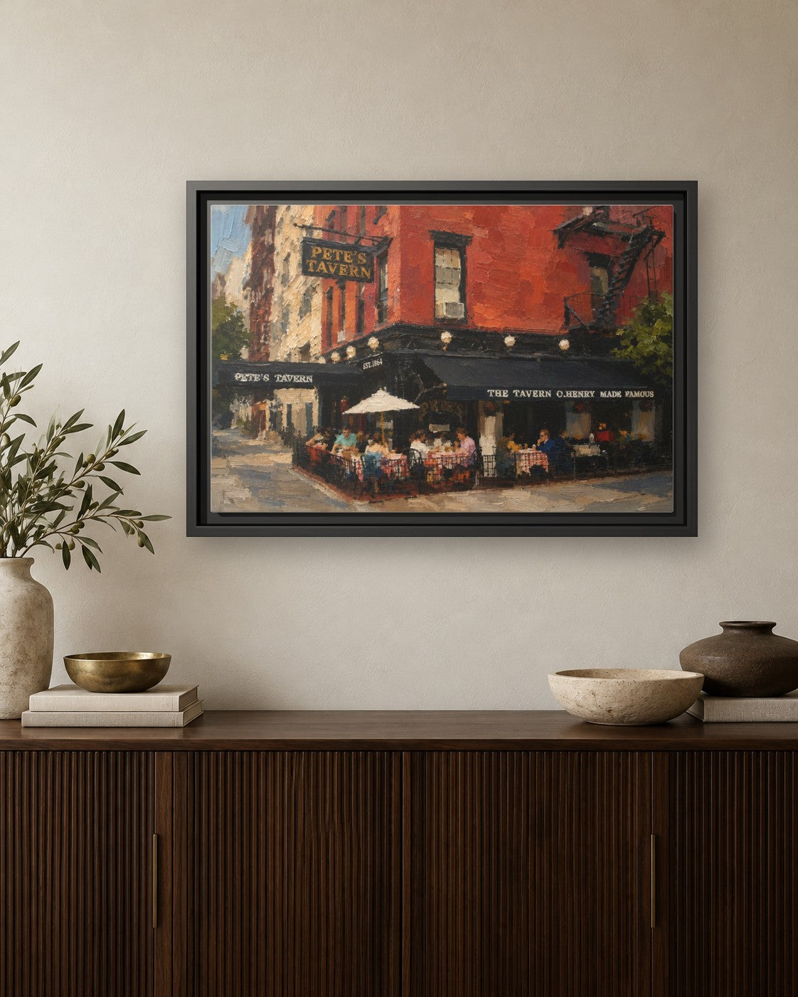 Pete's Tavern framed canvas print hanging above a credenza