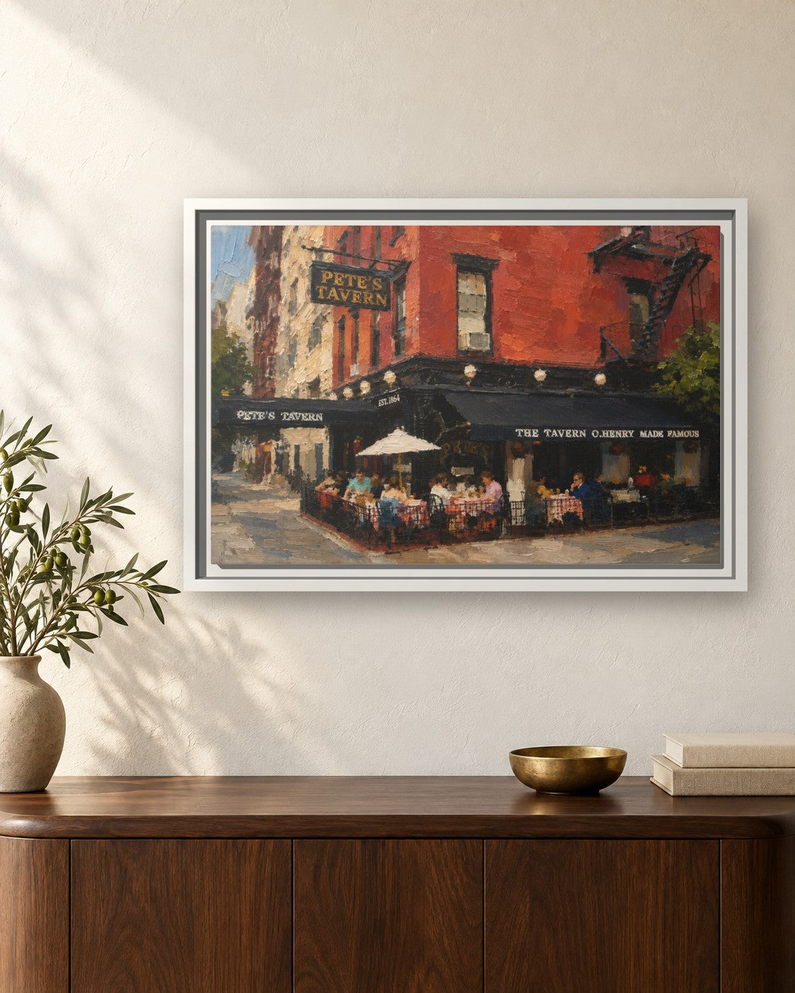 Pete's Tavern framed canvas print hanging above a sideboard