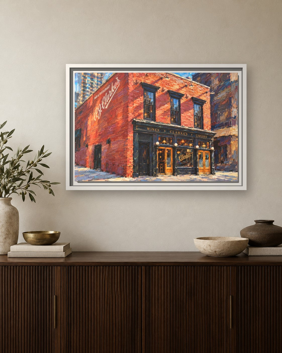 PJ Clarke's framed canvas print hanging above a sideboard