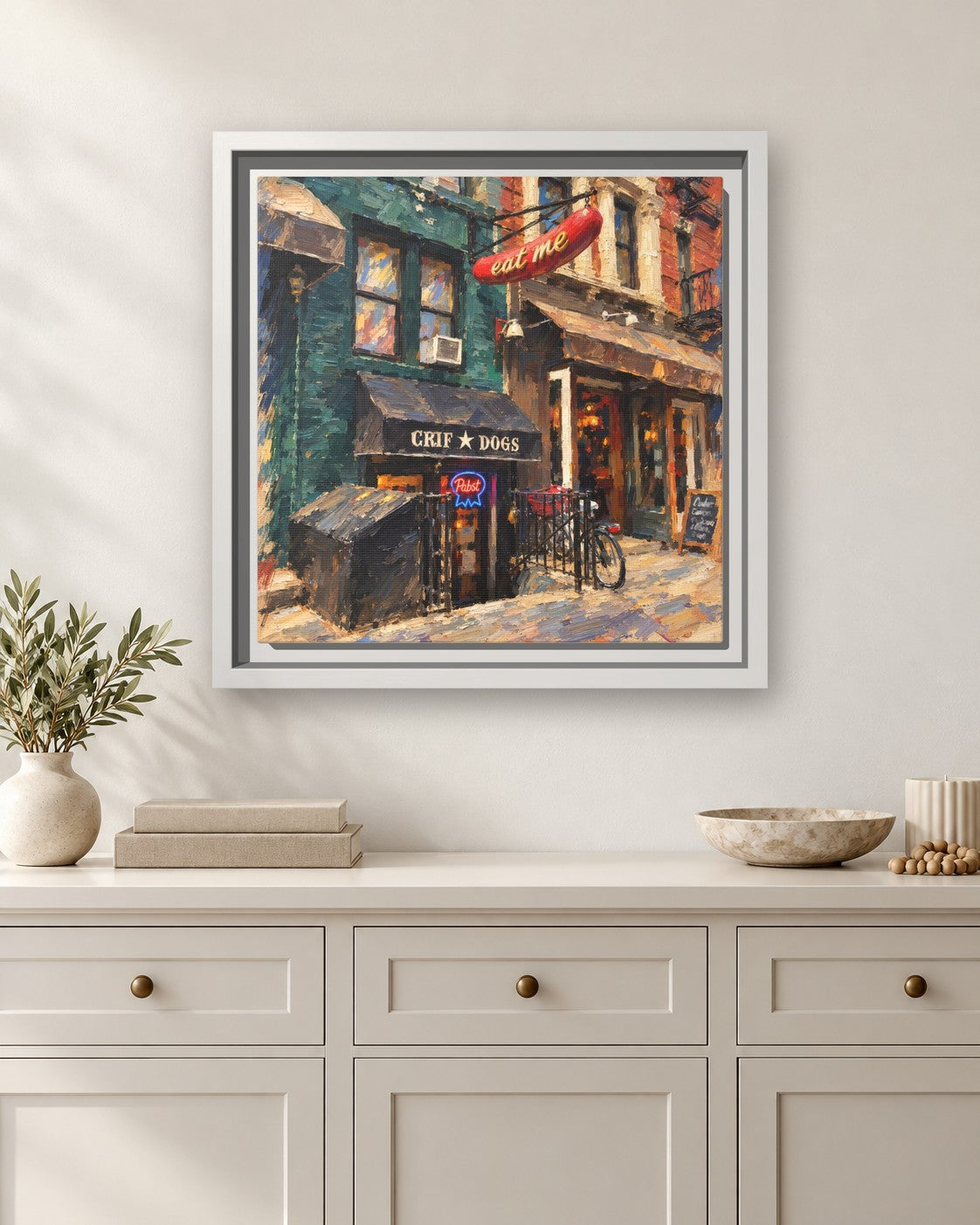 Please Don't Tell (PDT) framed canvas print hanging above a sideboard