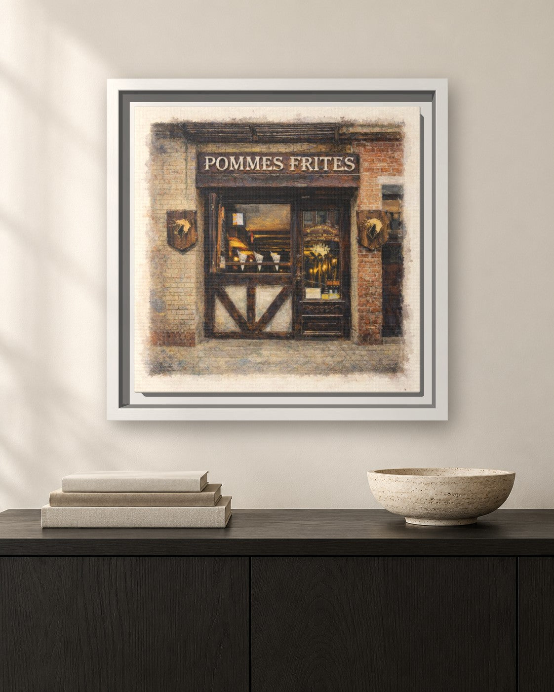 Pommes Frites framed canvas print hanging above a sideboard