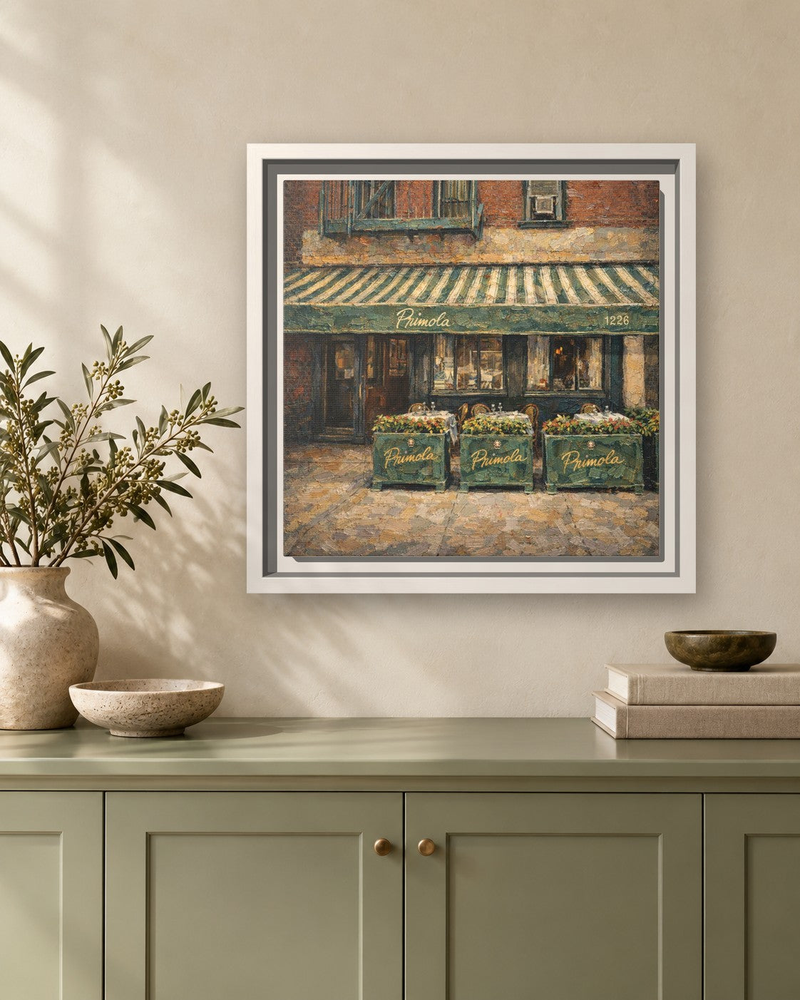 Primola framed canvas print hanging above a sideboard