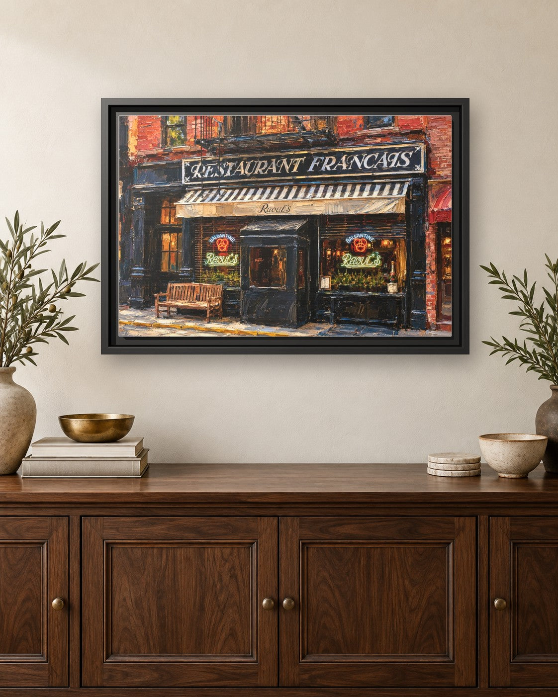 Raoul’s framed canvas print hanging above a credenza