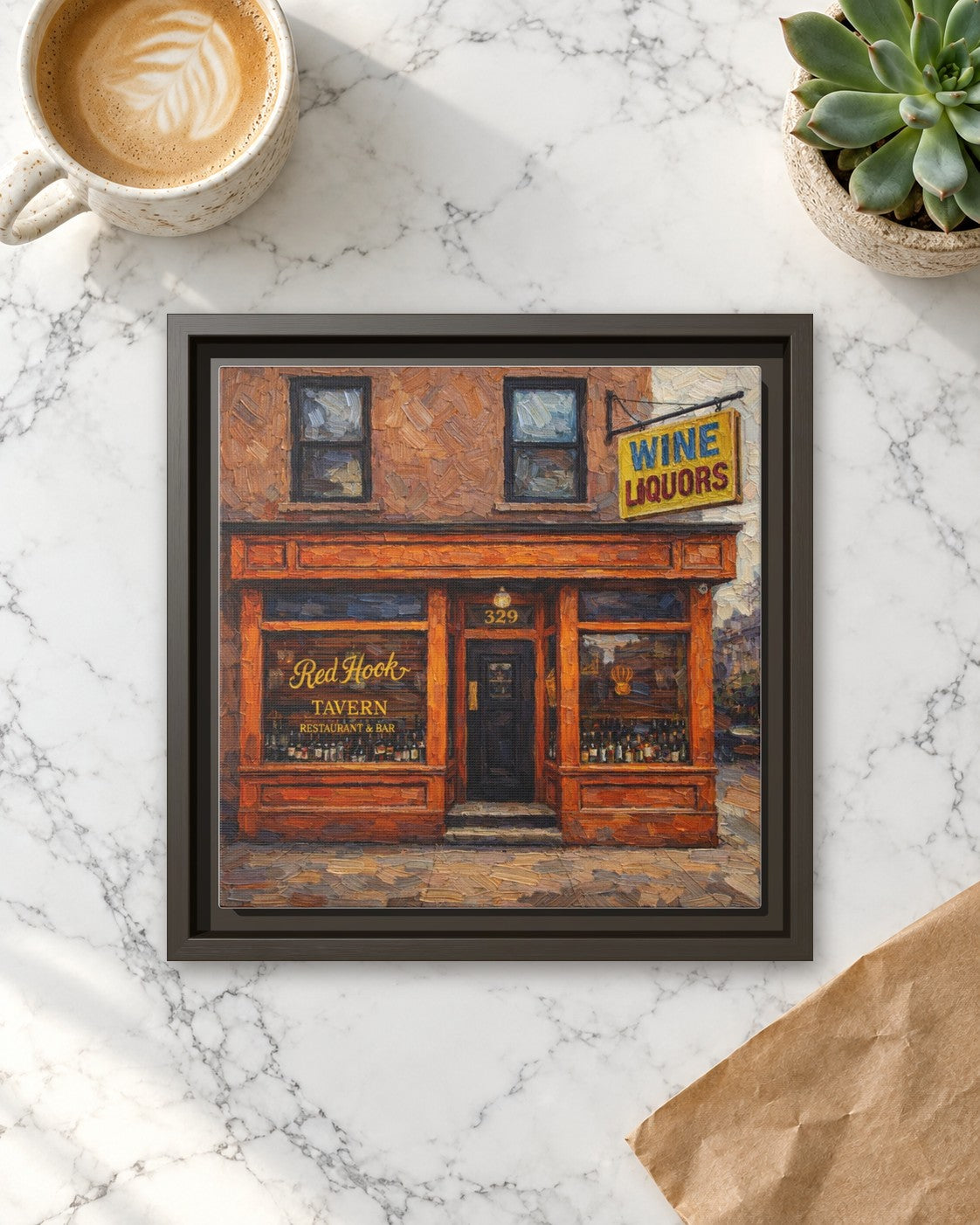 Red Hook Tavern framed canvas print lying on a table