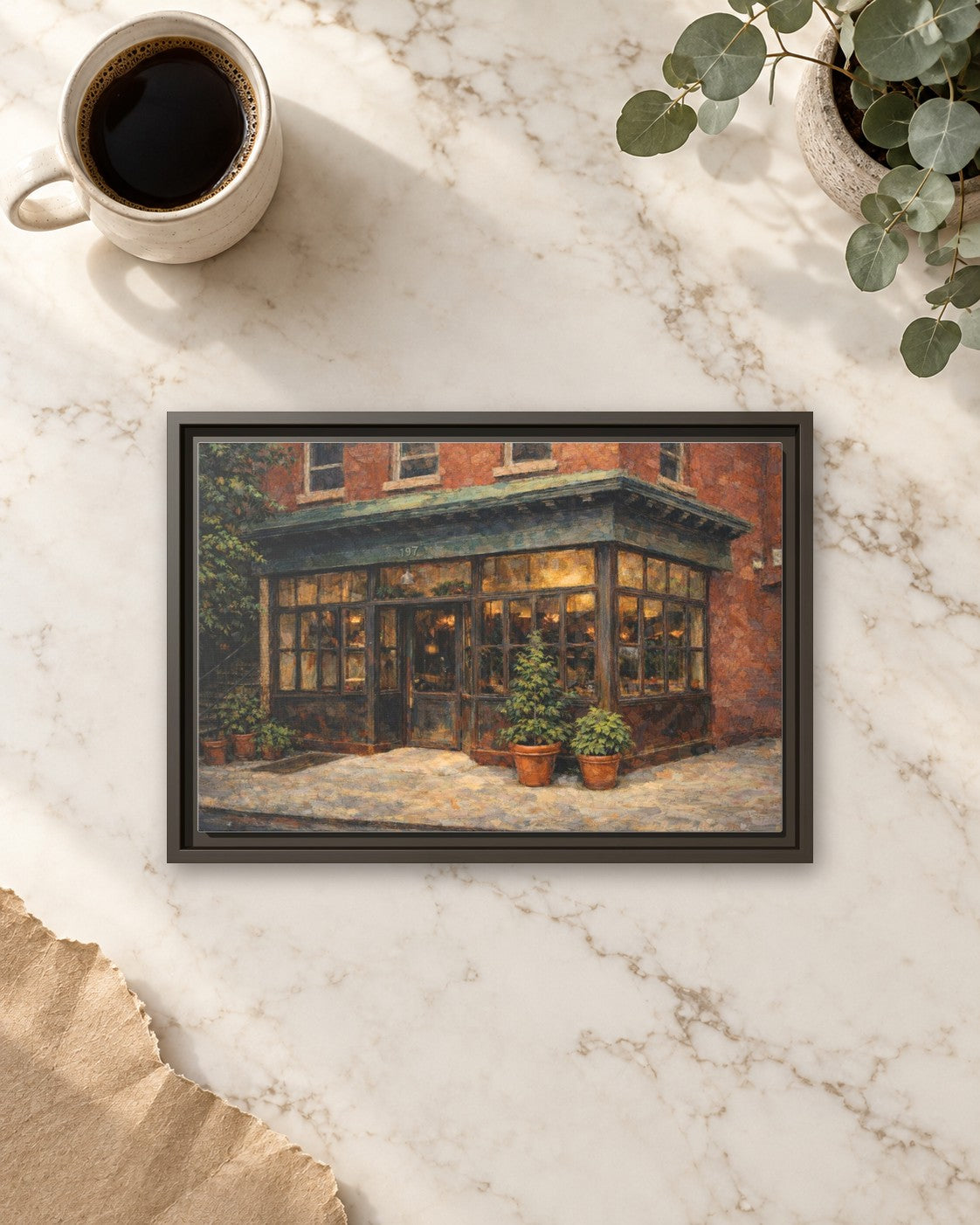 Rhodora Wine Bar framed canvas print lying on a table