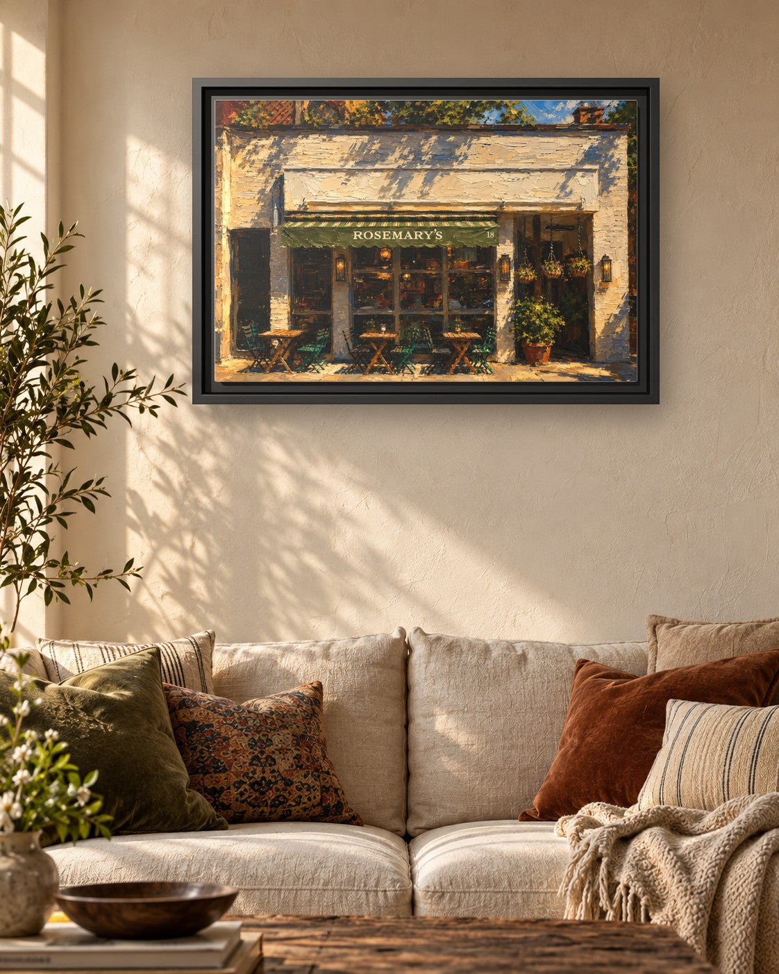 Rosemary's framed canvas print hanging above a sofa