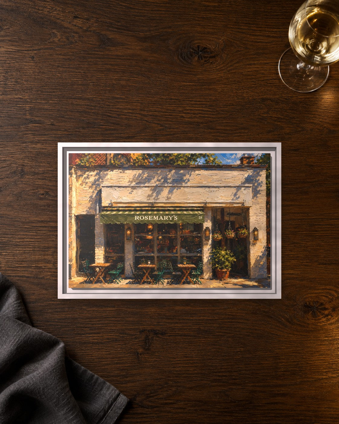 Rosemary's framed canvas print lying on a table