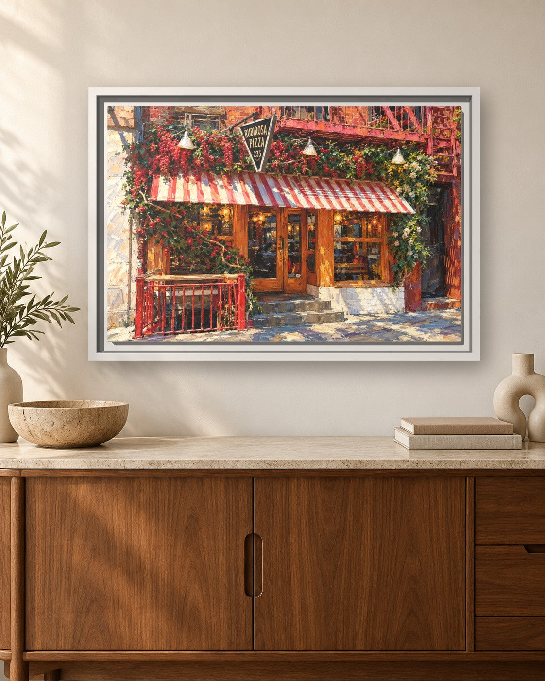 Rubirosa framed canvas print hanging above a sideboard