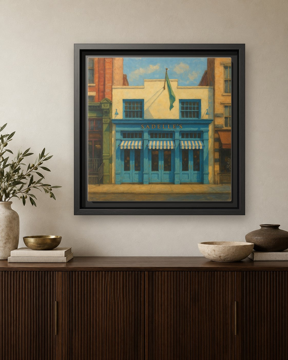 Sadelle's Restaurant framed canvas print hanging above a credenza