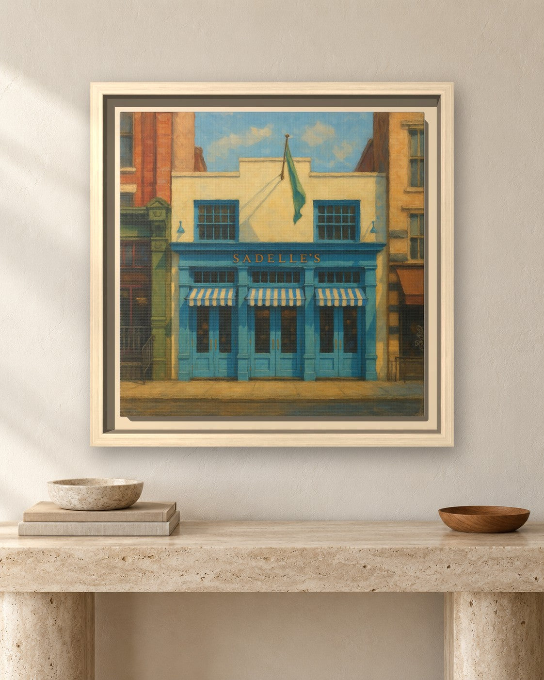 Sadelle's Restaurant framed canvas print hanging above a sideboard
