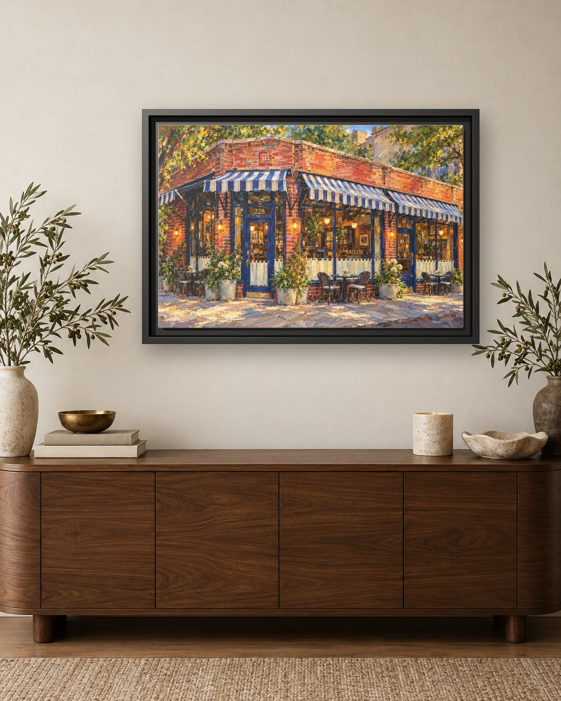 Sailor framed canvas print hanging above a credenza