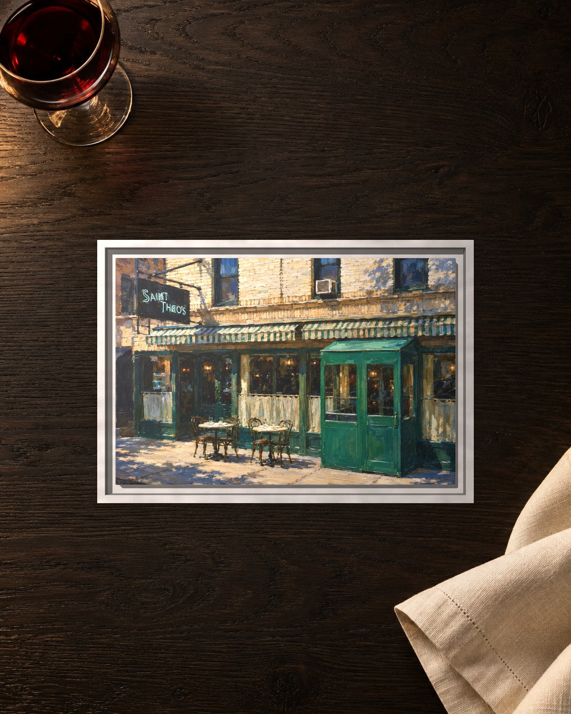Saint Theo's framed canvas print lying on a table