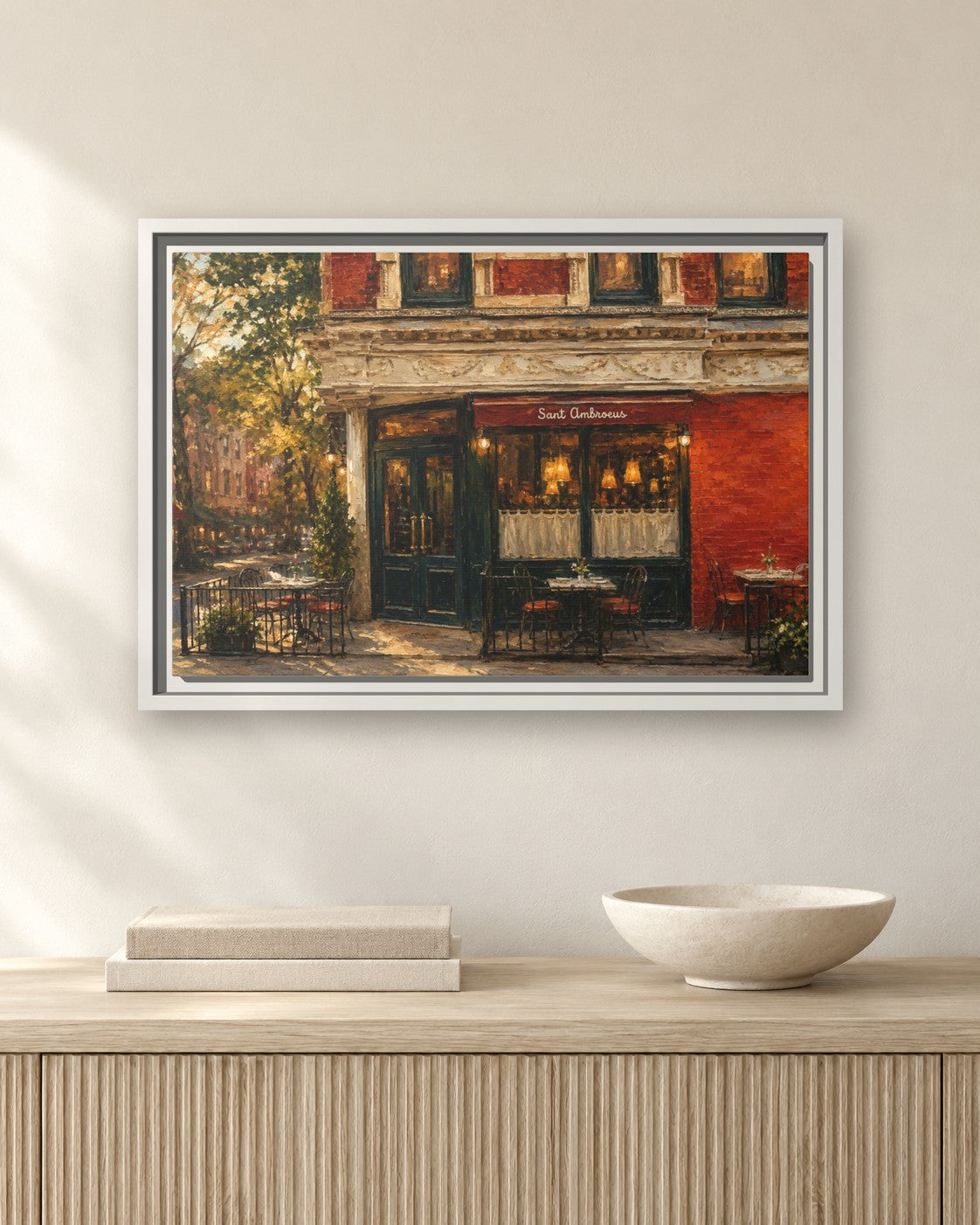 Sant Ambroeus West Village framed canvas print hanging above a sideboard