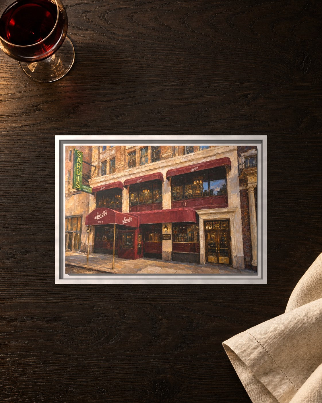 Sardi's framed canvas print lying on a table