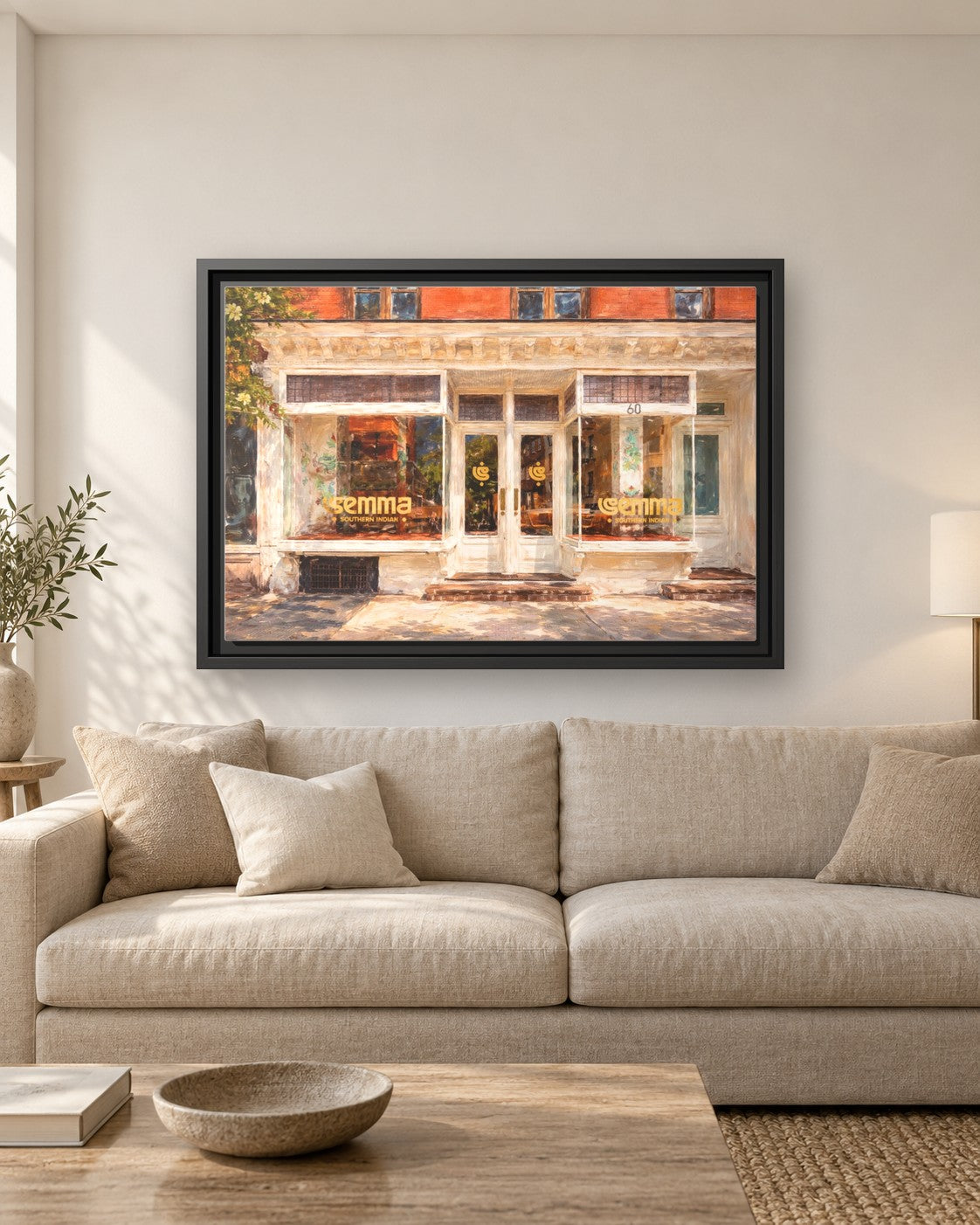 Semma framed canvas print hanging above a sofa