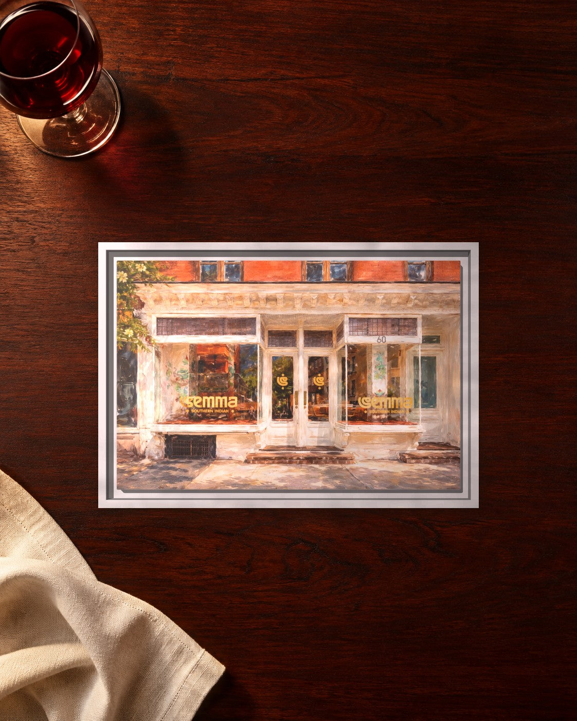 Semma framed canvas print lying on a table