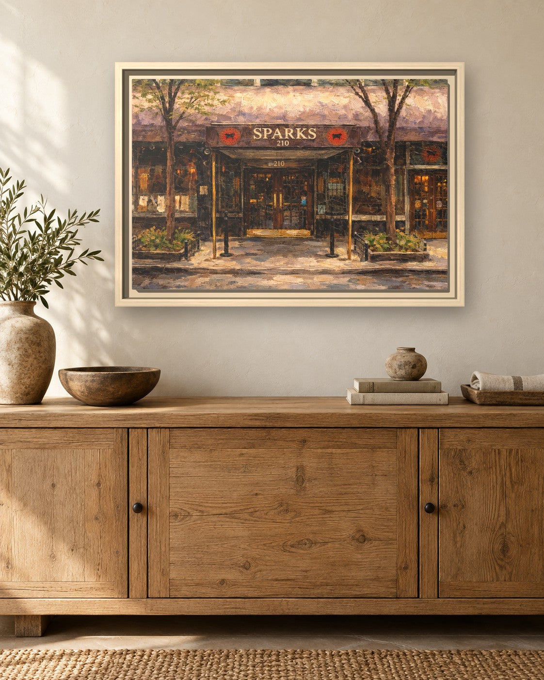 Sparks Steak House framed canvas print hanging above a sideboard