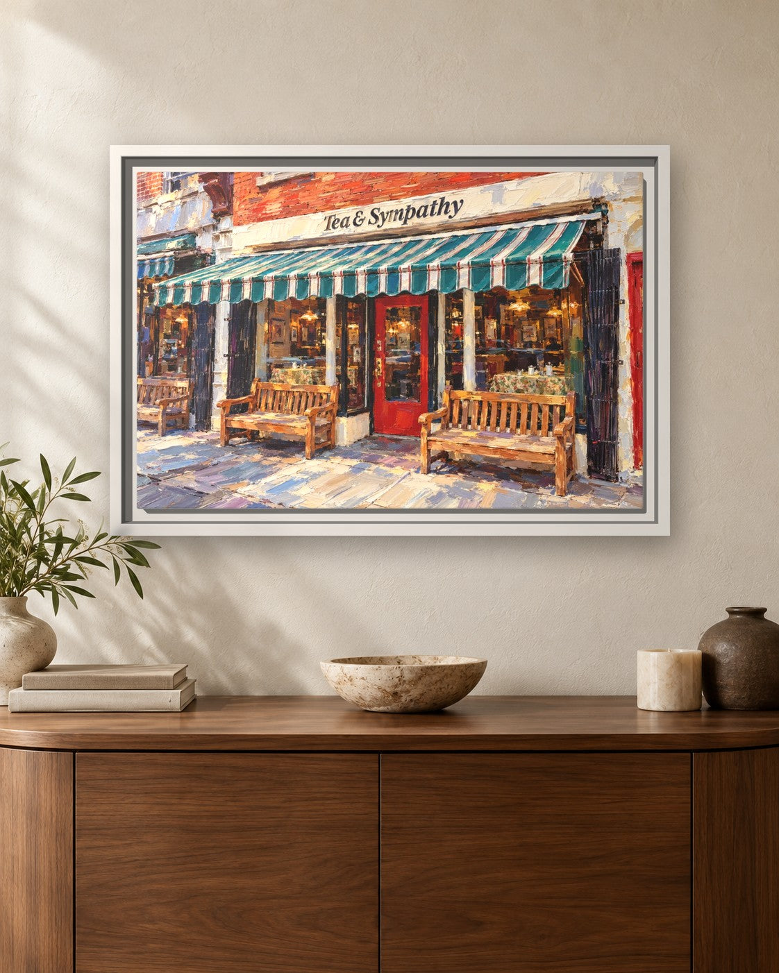 Tea & Sympathy framed canvas print hanging above a sideboard