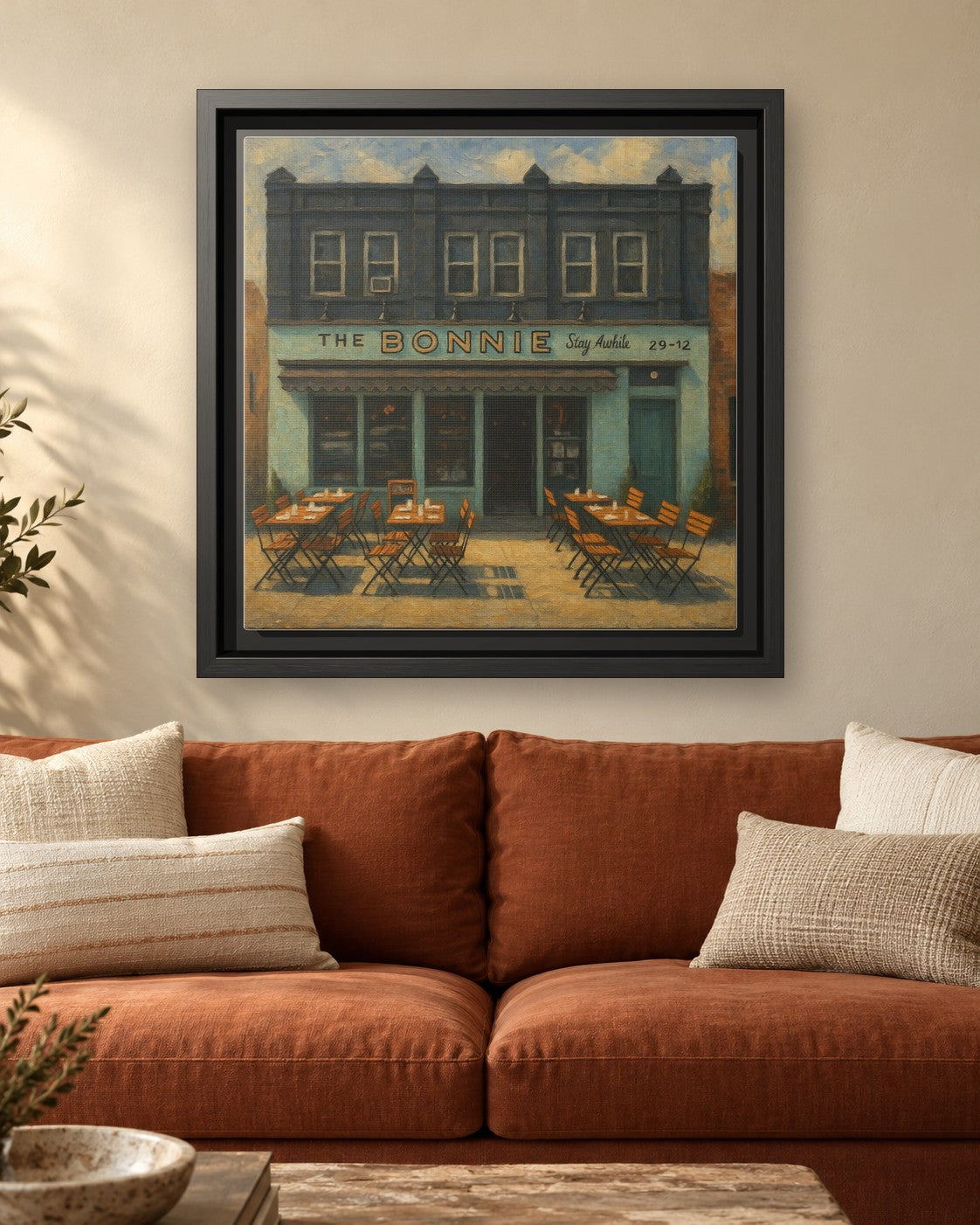 The Bonnie framed canvas print hanging above a sofa