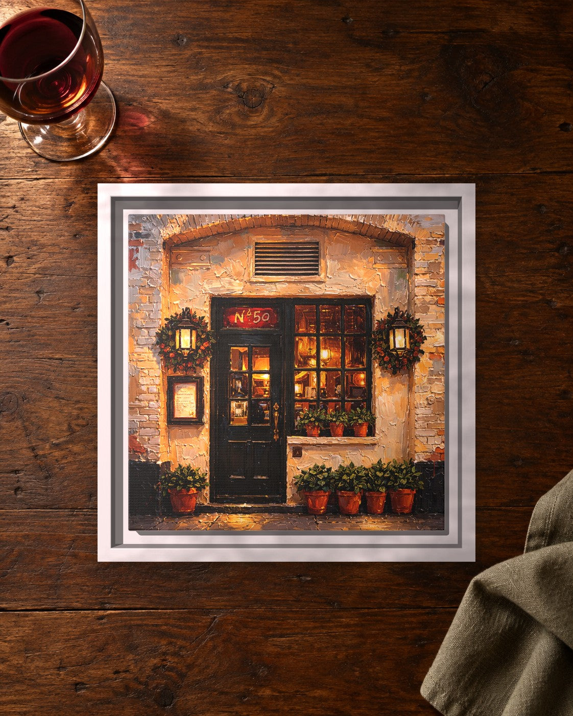 The Commerce Inn framed canvas print lying on a table