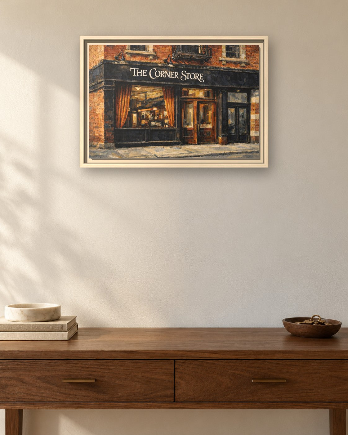 The Corner Store framed canvas print hanging above a sideboard