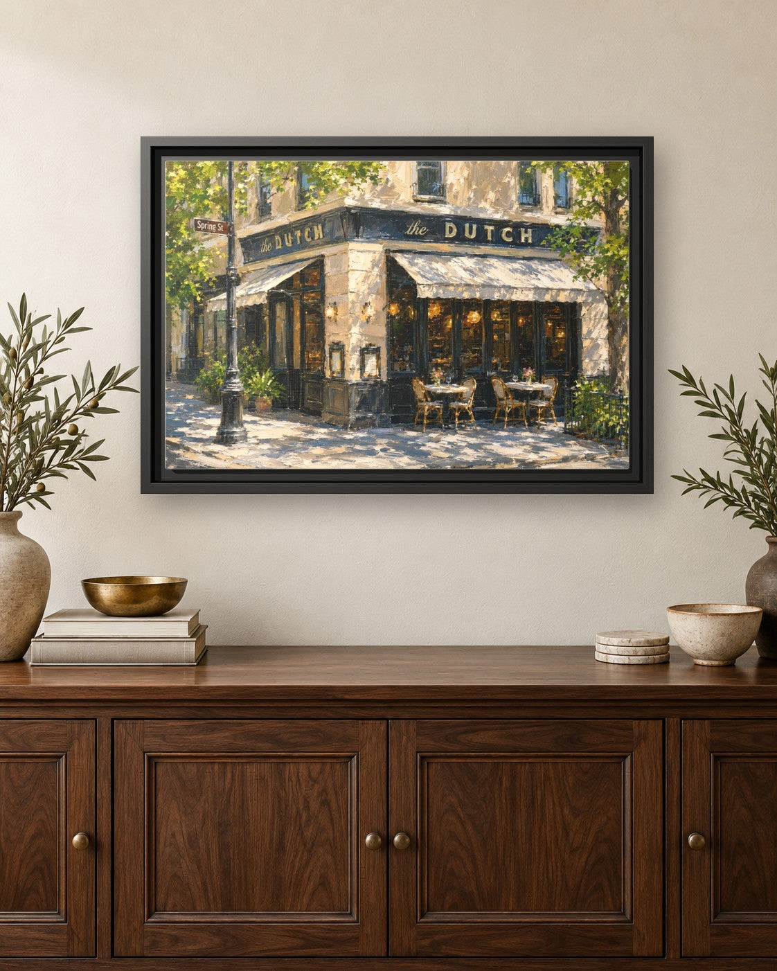 The Dutch framed canvas print hanging above a credenza