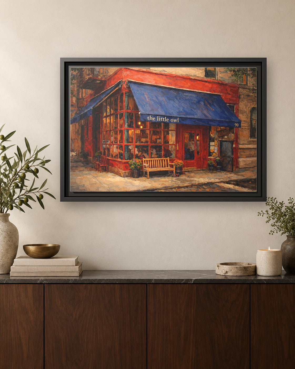 The Little Owl framed canvas print hanging above a credenza