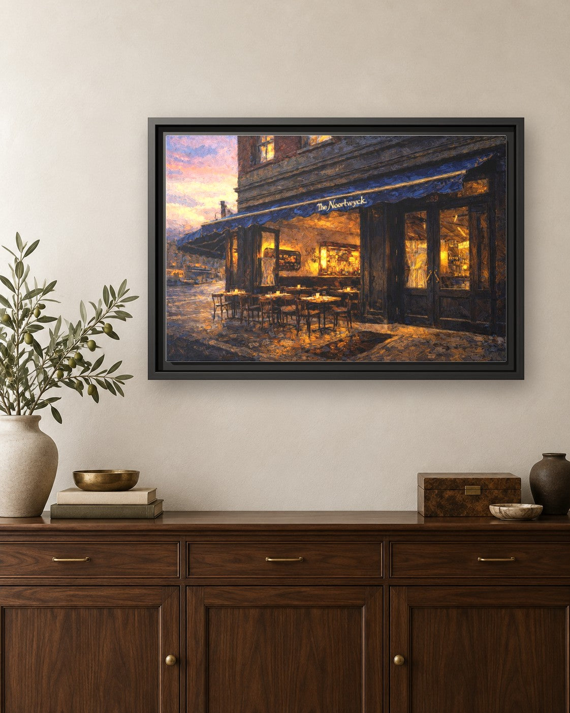 The Noortwyk framed canvas print hanging above a credenza